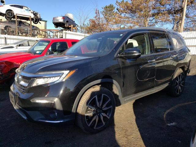 Obraz 1 z 2019 HONDA PILOT TOURING 2019 z VIN 5FNYF6H65KB097732