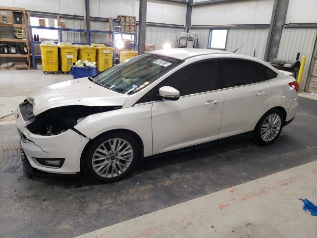 Image 1 of 2015 FORD FOCUS TITANIUM 2015 with VIN 1FADP3J22FL340858