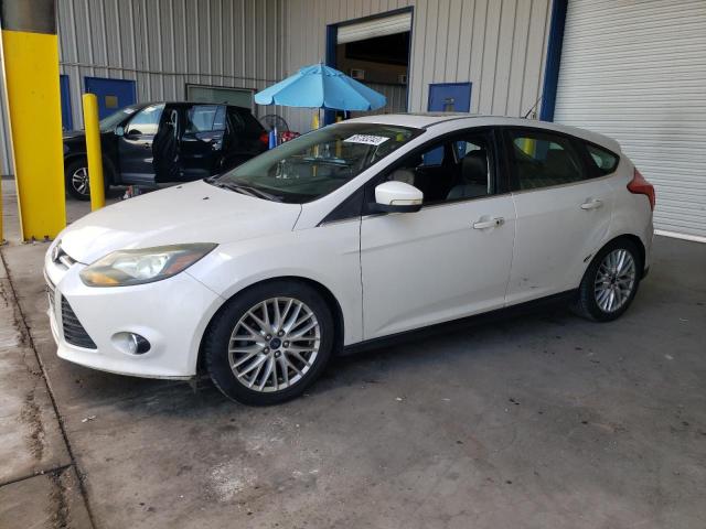 Image 1 of 2014 FORD FOCUS TITANIUM 2014 with VIN 1FADP3N26EL255000
