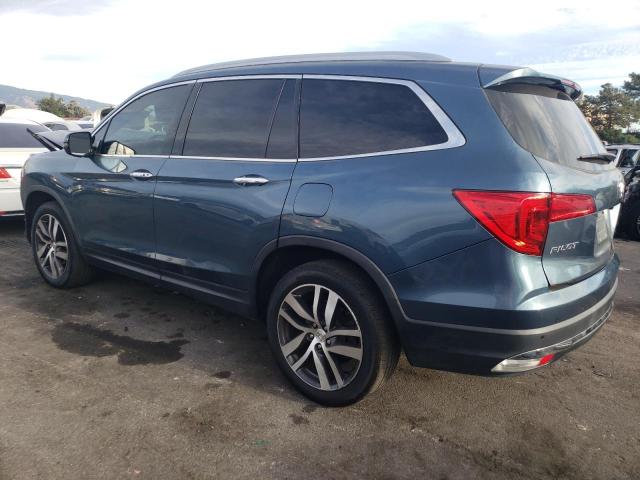 Изображение 2 2018 HONDA PILOT TOURING 2018 с VIN 5FNYF6H90JB041819