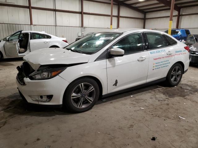 Image 1 of 2018 FORD FOCUS SE 2018 with VIN 1FADP3FE1JL215684