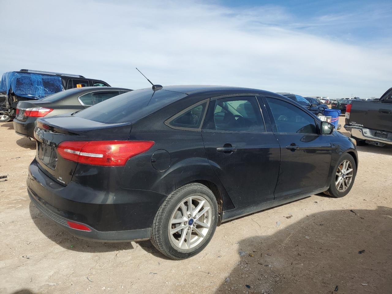 Image 3 of 2015 FORD FOCUS SE 2015 with VIN 1FADP3F24FL230435