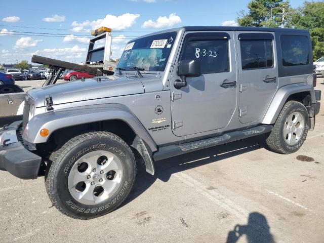 Image 1 of 2015 JEEP WRANGLER UNLIMITED SAHARA 2015 with VIN 1C4BJWEG9FL744055