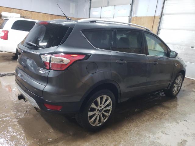 Obraz 3 z 2017 FORD ESCAPE TITANIUM 2017 z VIN 1FMCU9J97HUB75476
