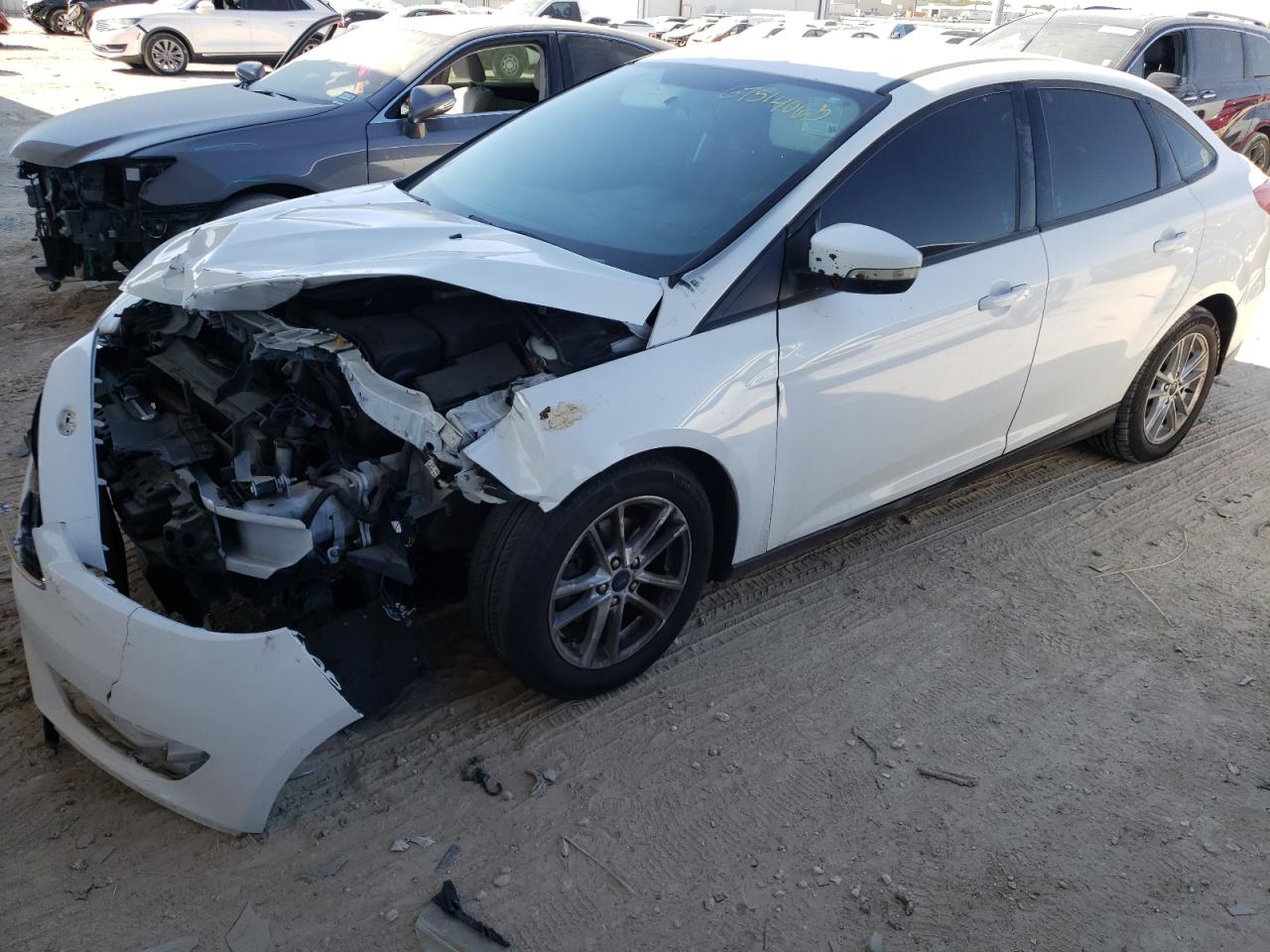 Image 1 of 2017 FORD FOCUS SE 2017 with VIN 1FADP3F22HL300016