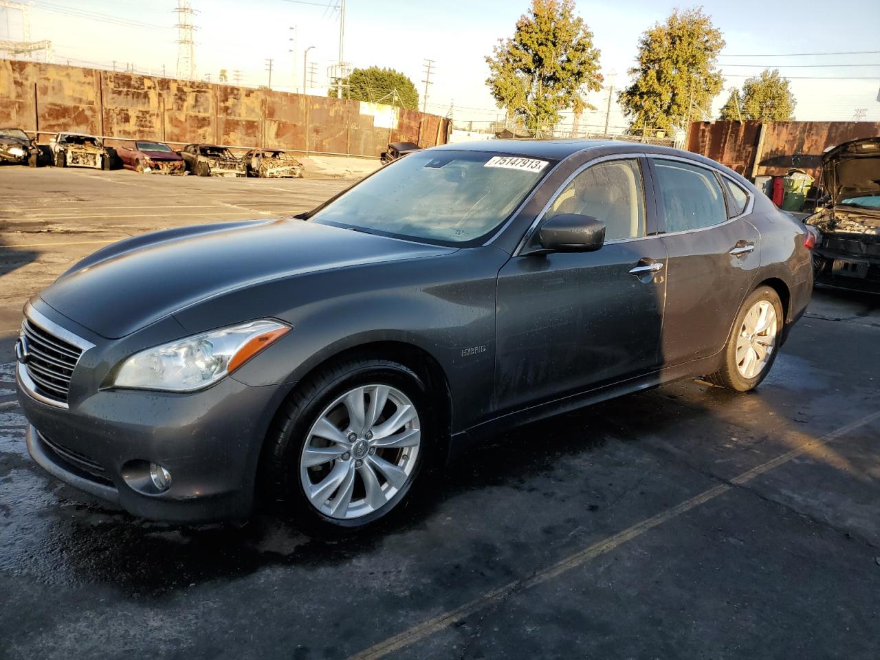 Image 1 of 2012 INFINITI M35H 2012 with VIN JN1EY1AP8CM910947