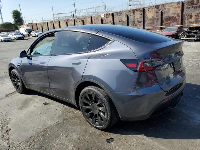 Изображение 2 2023 TESLA MODEL Y  2023 с VIN 7SAYGDEE0PF886877