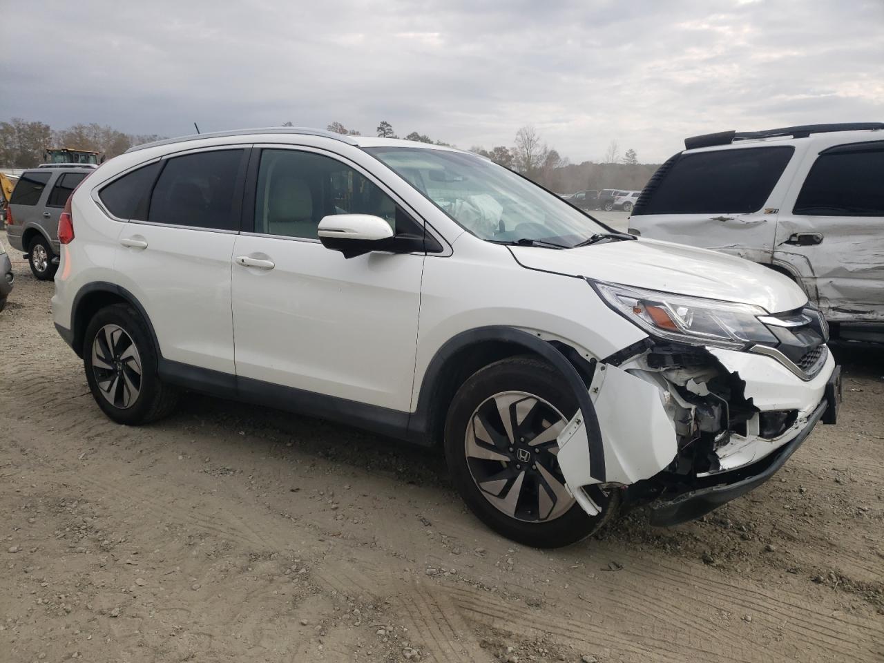 Obraz 1 z 2016 HONDA CR-V TOURING 2016 z VIN 5J6RM4H94GL105357