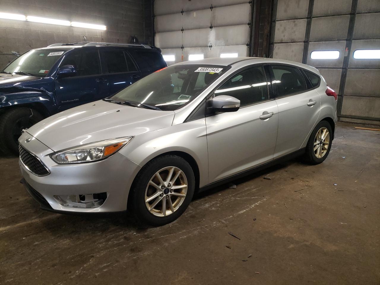 Obraz 1 z 2015 FORD FOCUS SE 2015 z VIN 1FADP3K21FL277623