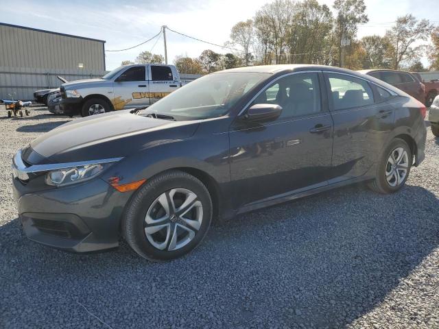 Obraz 1 z 2018 HONDA CIVIC LX 2018 z VIN 19XFC2F59JE042840