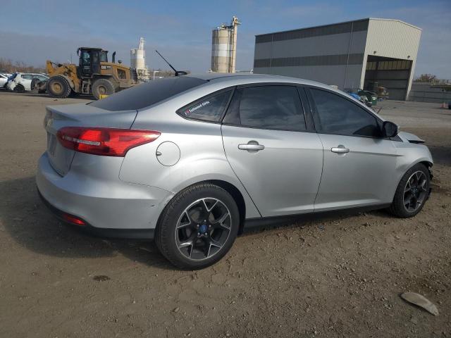Image 3 of 2016 FORD FOCUS SE 2016 with VIN 1FADP3F28GL304599