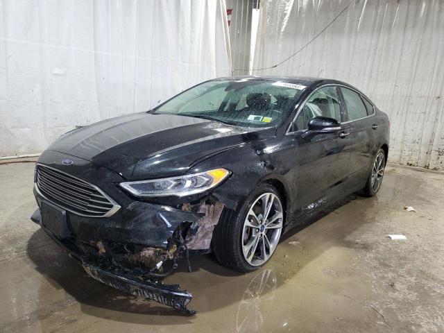 Image 1 of 2017 FORD FUSION TITANIUM 2017 with VIN 3FA6P0D92HR120558