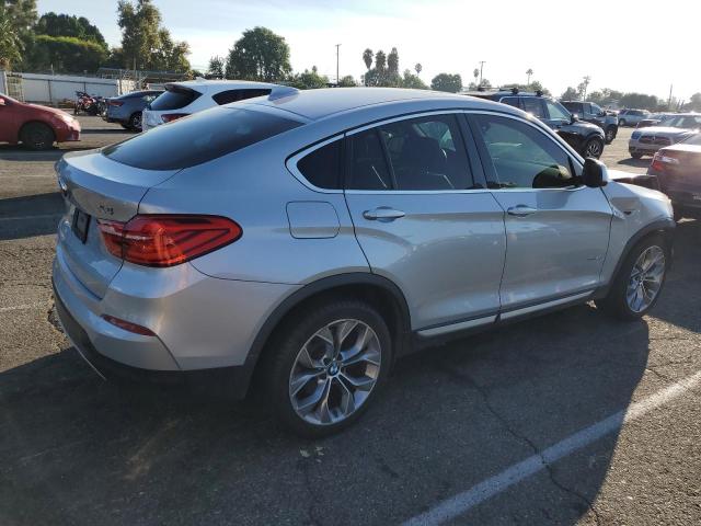 Obraz 3 z 2018 BMW X4 XDRIVE28I 2018 z VIN 5UXXW3C57J0T81478
