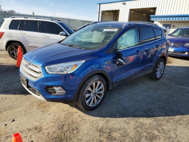 Image 1 of 2017 FORD ESCAPE TITANIUM 2017 with VIN 1FMCU0J99HUD51987