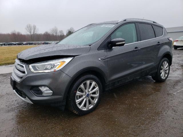 Image 1 of 2017 FORD ESCAPE TITANIUM 2017 with VIN 1FMCU9J97HUD37512