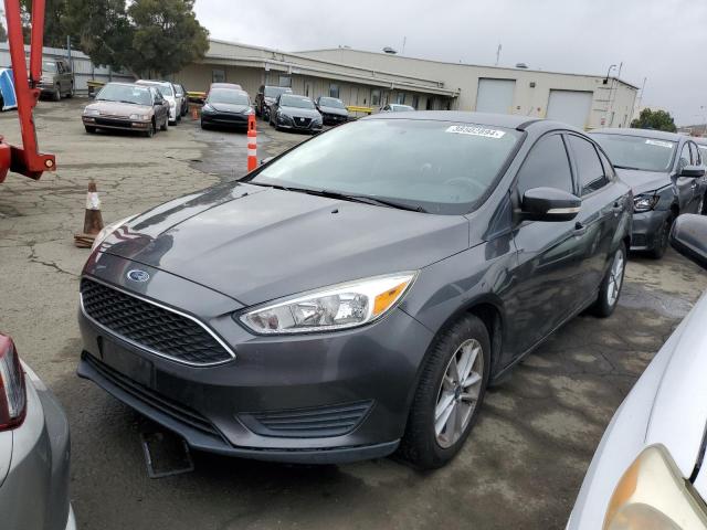 Image 1 of 2017 FORD FOCUS SE 2017 with VIN 1FADP3F27HL304370