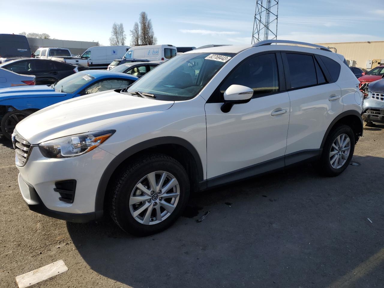 Image 1 of 2016 MAZDA CX-5 SPORT 2016 with VIN JM3KE2BY2G0849377