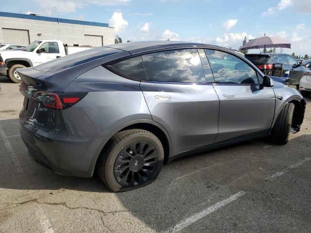 Obraz 3 z 2023 TESLA MODEL Y  2023 z VIN 7SAYGDEE8PA056130