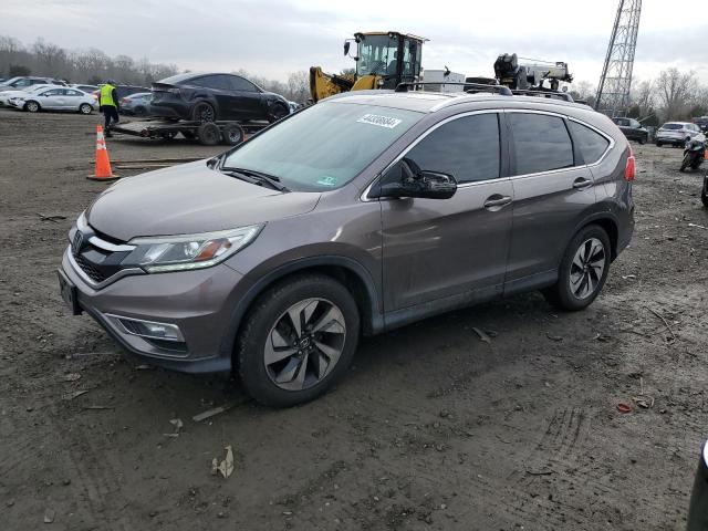 Obraz 1 z 2015 HONDA CR-V TOURING 2015 z VIN 5J6RM4H9XFL016813