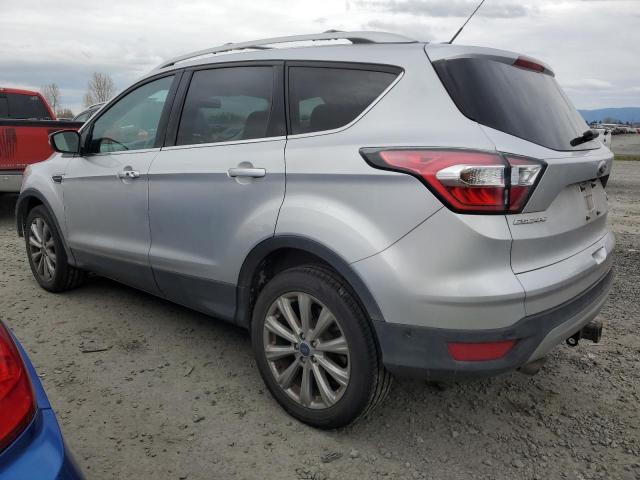 Obraz 2 z 2017 FORD ESCAPE TITANIUM 2017 z VIN 1FMCU9J99HUA15549
