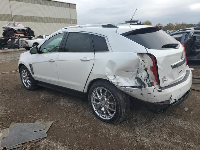 Изображение 2 2014 CADILLAC SRX PREMIUM COLLECTION 2014 с VIN 3GYFNGE38ES610780