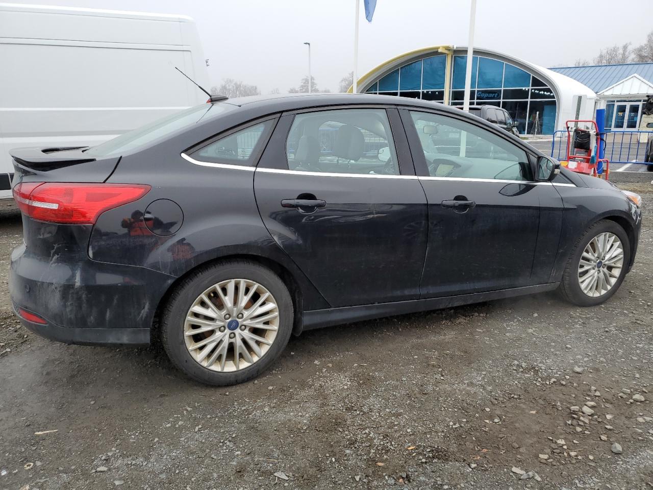 Image 3 of 2018 FORD FOCUS TITANIUM 2018 with VIN 1FADP3J2XJL261575