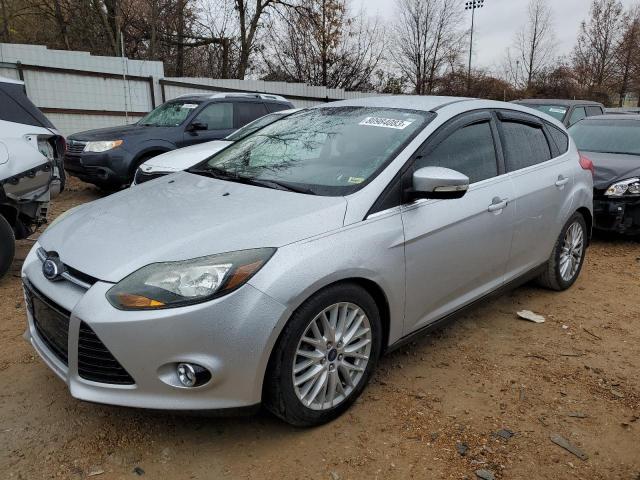 Image 1 of 2014 FORD FOCUS TITANIUM 2014 with VIN 1FADP3N23EL450777