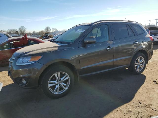 Image 1 of 2012 HYUNDAI SANTA FE LIMITED 2012 with VIN 5XYZKDAG7CG169791