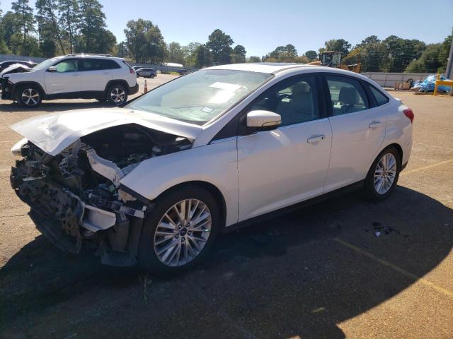 Image 1 of 2017 FORD FOCUS TITANIUM 2017 with VIN 1FADP3J25HL272655