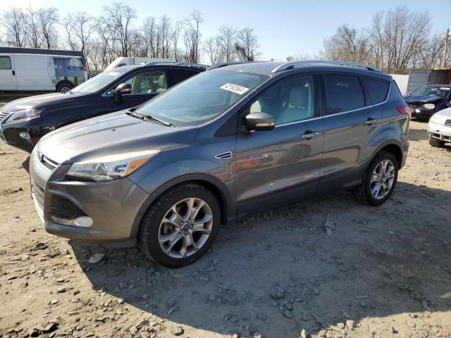 Obraz 1 z 2014 FORD ESCAPE TITANIUM 2014 z VIN 1FMCU0J9XEUB12833