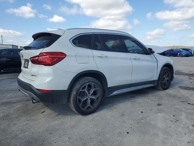 Obraz 3 z 2018 BMW X1 SDRIVE28I 2018 z VIN WBXHU7C34J5L08589