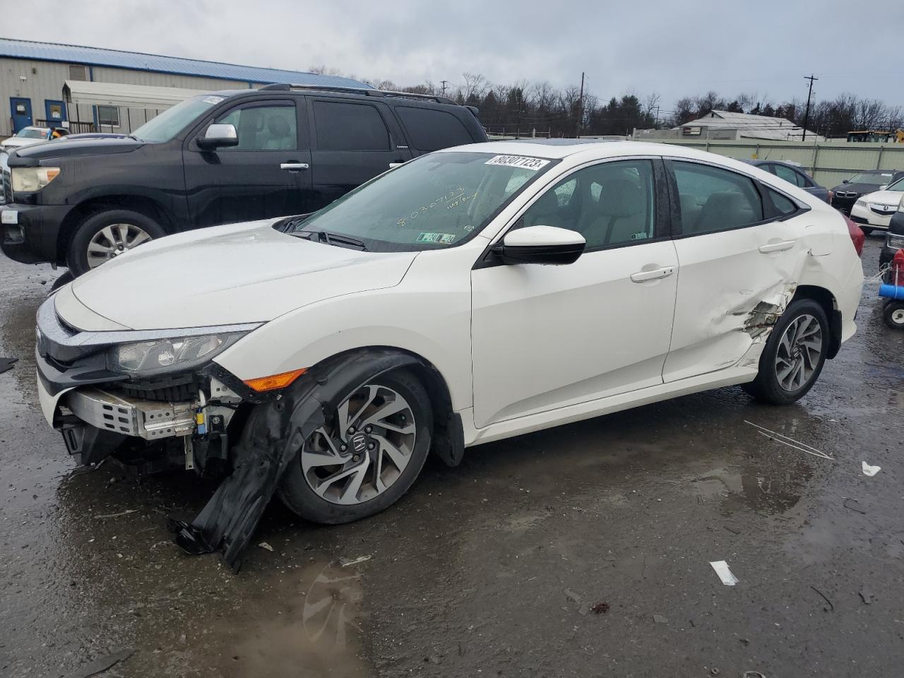 Image 1 of 2018 HONDA CIVIC EX 2018 with VIN 19XFC2F72JE209847