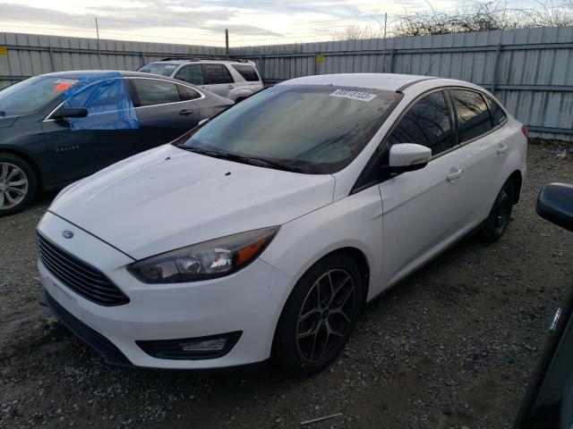 Image 1 of 2017 FORD FOCUS SE 2017 with VIN 1FADP3FE4HL348515