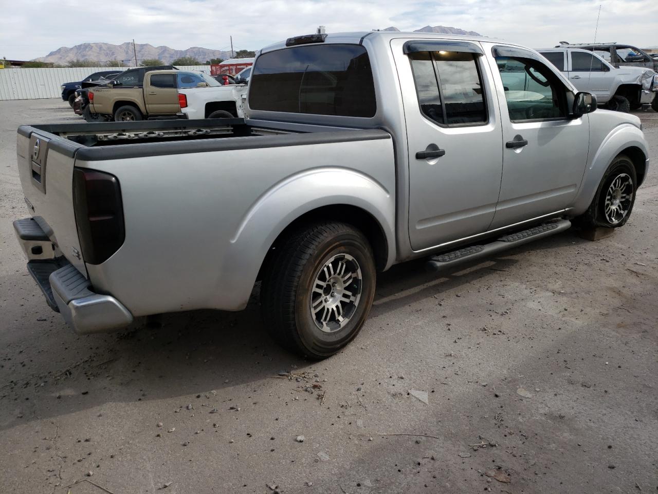 Изображение 3 Nissan Frontier Crew Cab Se 2009 с VIN 1N6AD07U29C409594