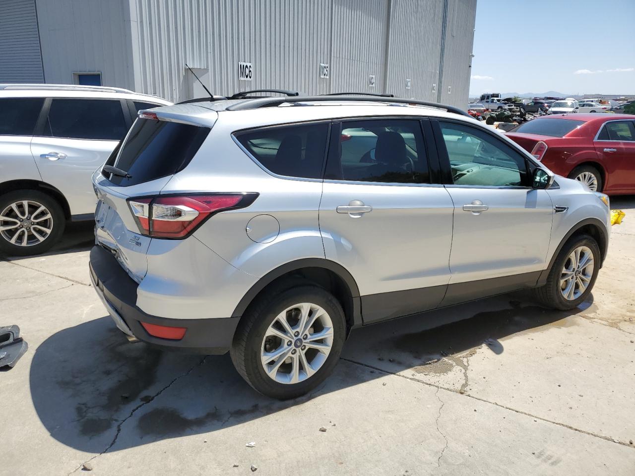 Изображение 3 2017 FORD ESCAPE SE 2017 с VIN 1FMCU9G90HUC02637