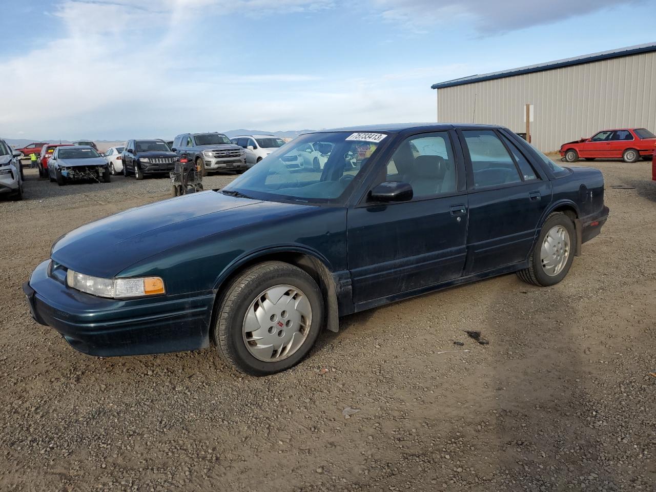 Obraz 1 z 1995 OLDSMOBILE CUTLASS SUPREME SL 1995 z VIN 1G3WH52MXSD394294