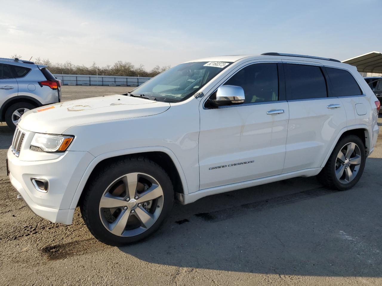 Image 1 of 2015 JEEP GRAND CHEROKEE OVERLAND 2015 with VIN 1C4RJFCM2FC196486
