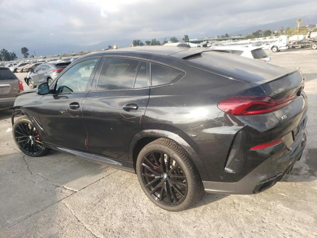 Изображение 2 2021 BMW X6 M50I 2021 с VIN 5UXCY8C04M9F79559