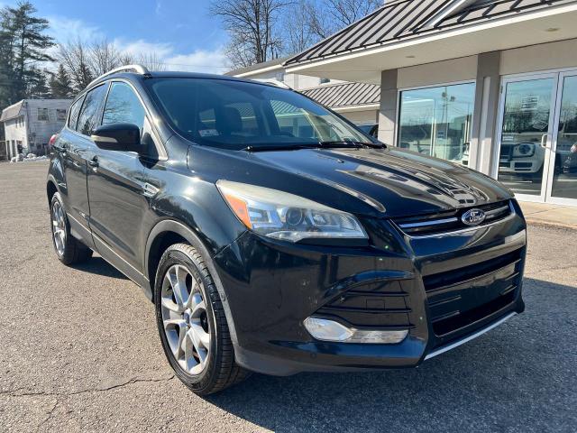 Obraz 1 z 2015 FORD ESCAPE TITANIUM 2015 z VIN 1FMCU9J98FUC09910