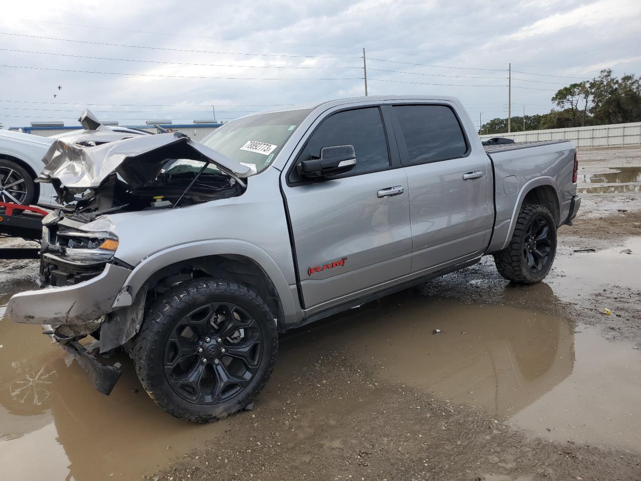 Image 1 of 2022 RAM 1500 LIMITED 2022 with VIN 1C6SRFHT6NN360679