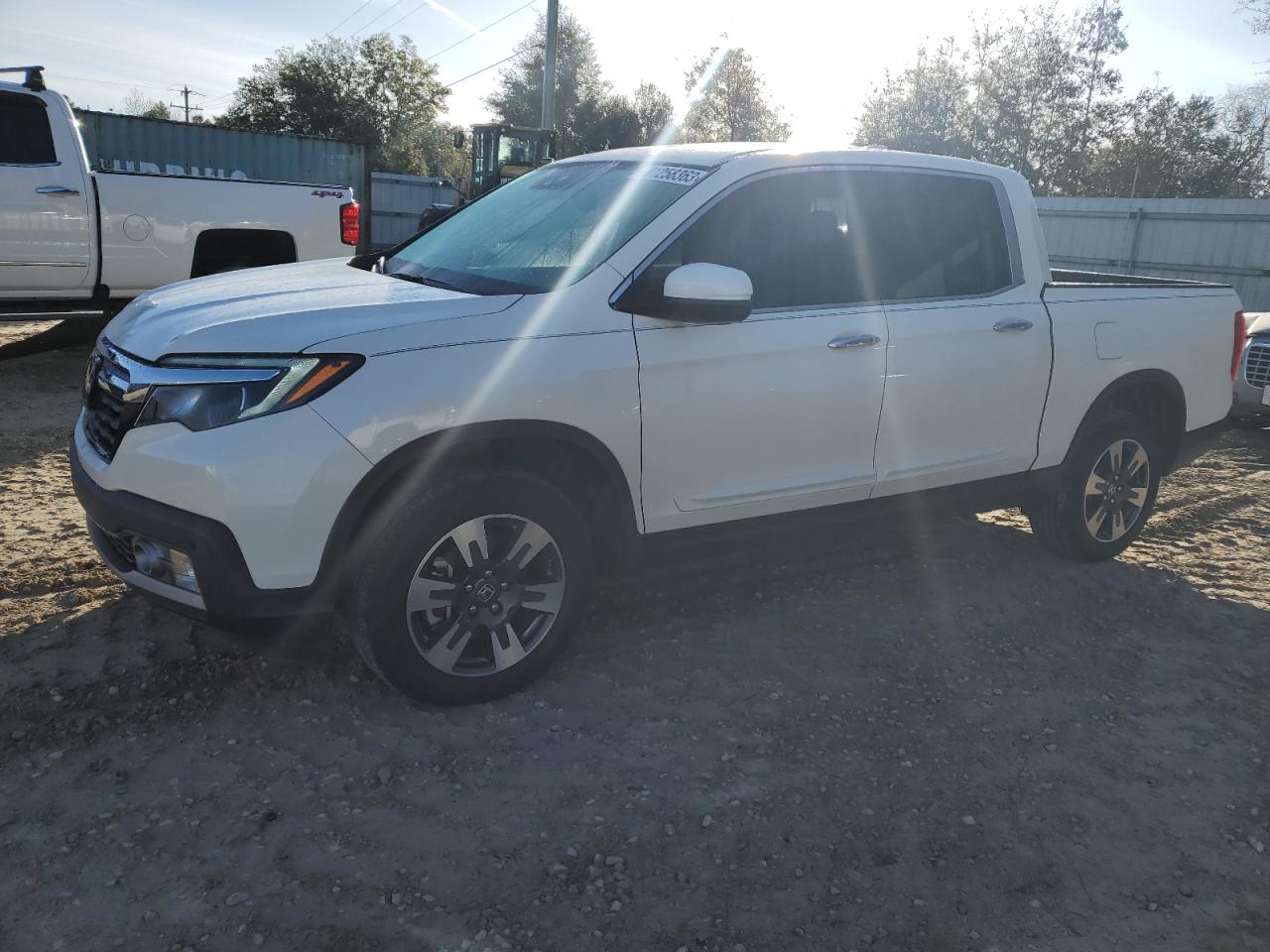 Obraz 1 z 2017 HONDA RIDGELINE RTL 2017 z VIN 5FPYK3F76HB010782