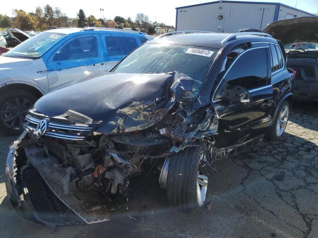 Image 1 of 2014 VOLKSWAGEN TIGUAN S 2014 with VIN WVGAV3AX5EW008727