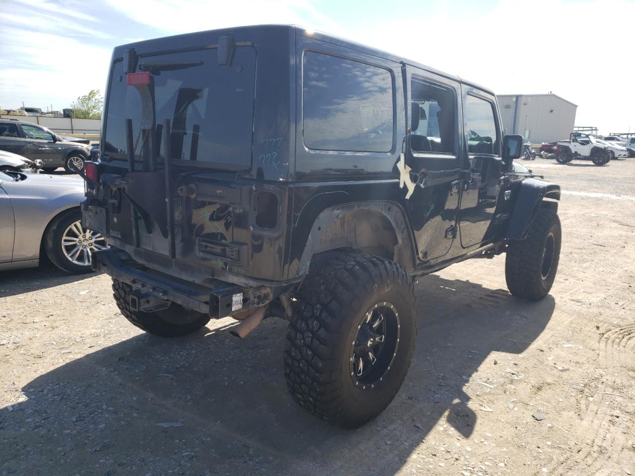 Obraz 3 z Jeep Wrangler Unlimited Rubicon 2012 z VIN 1C4BJWFG8CL202195