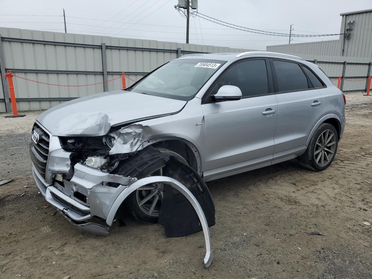 Image 1 of 2018 AUDI Q3 PREMIUM 2018 with VIN WA1BCCFSXJR032102