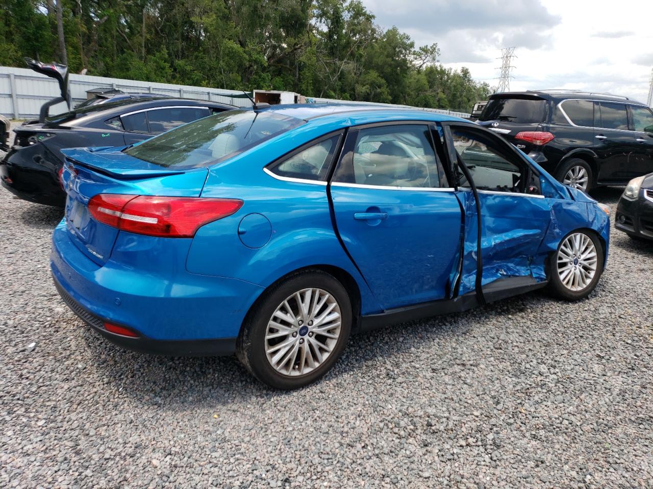 Изображение 3 2017 FORD FOCUS TITANIUM 2017 с VIN 1FADP3J27HL212960