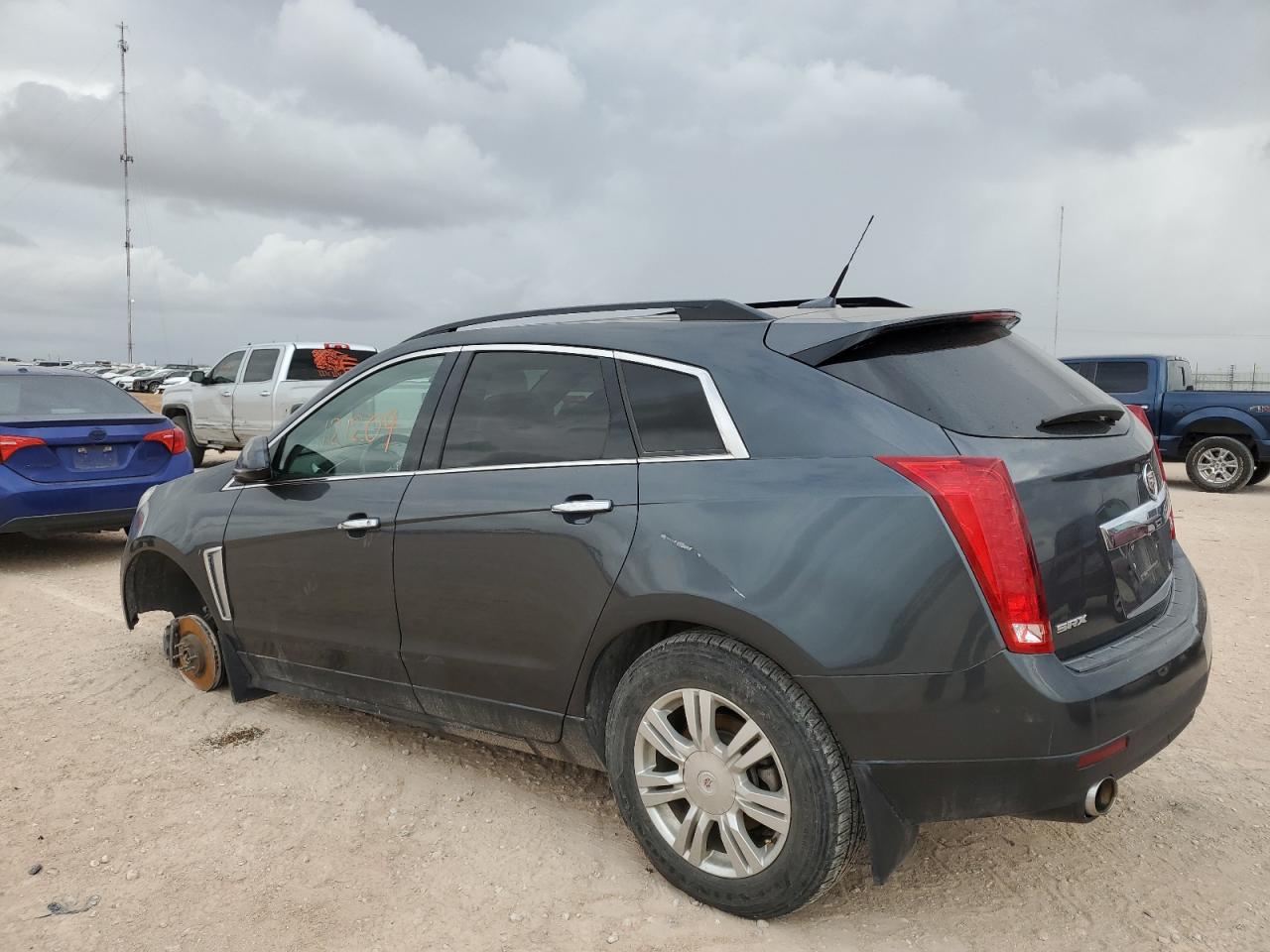Изображение 2 Cadillac Srx 2013 с VIN 3GYFNAE35DS549982