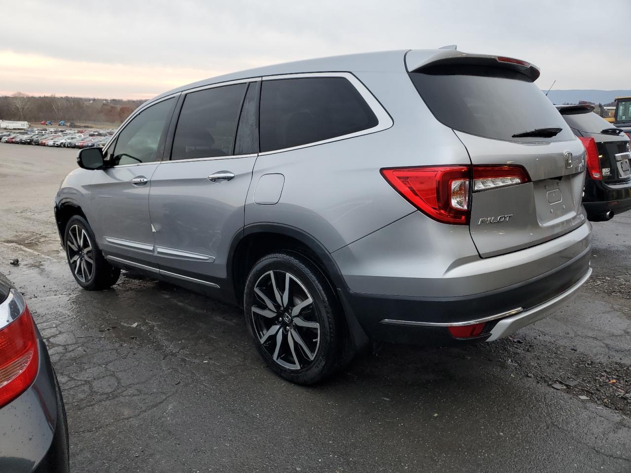 Изображение 2 Honda Pilot Elite 2019 с VIN 5FNYF6H07KB058510