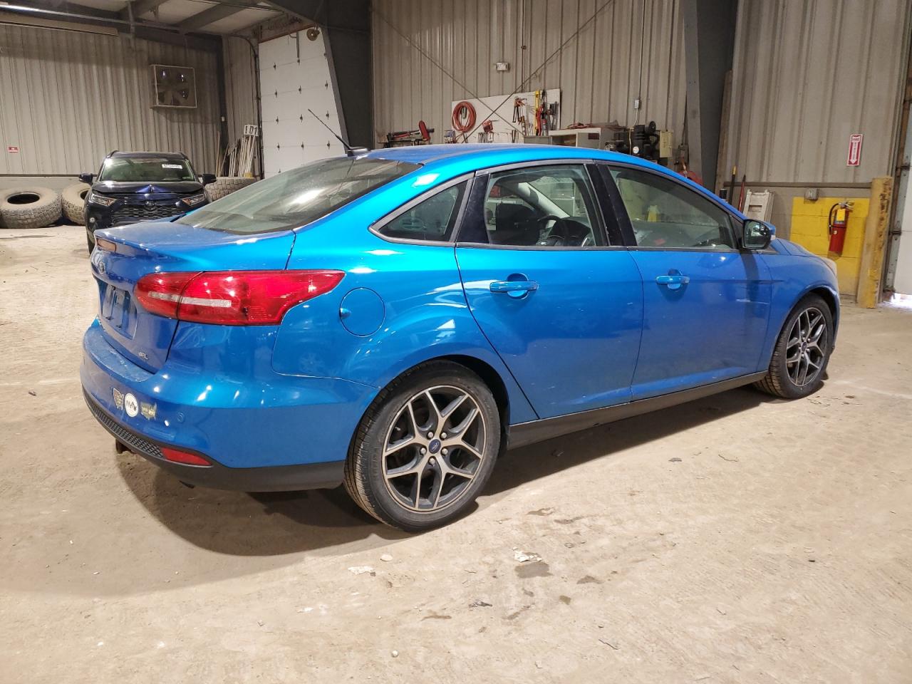 Image 3 of 2017 FORD FOCUS SEL 2017 with VIN 1FADP3H24HL203333