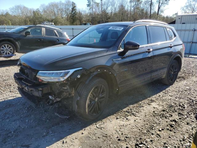 Image 1 of 2022 VOLKSWAGEN TIGUAN SE R-LINE BLACK 2022 with VIN 3VVCB7AX0NM104554