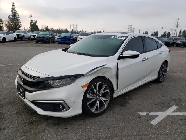 Obraz 1 z 2020 HONDA CIVIC TOURING 2020 z VIN 19XFC1F90LE200921